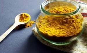 What is ground turmeric used for. Turmeric powder in a jar