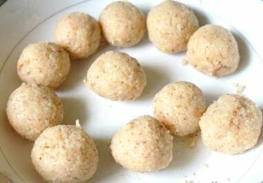 Rool coconut laddoo into balls