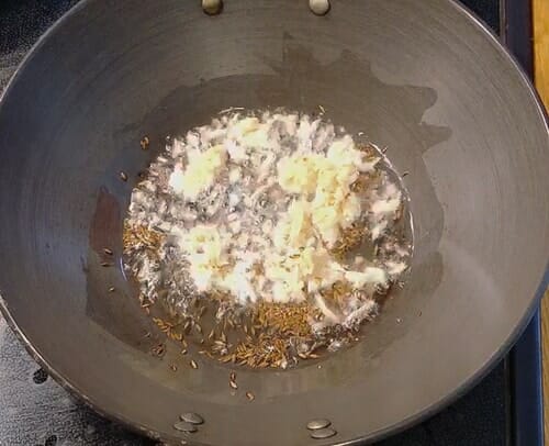 Crushed garlic in hot oil 