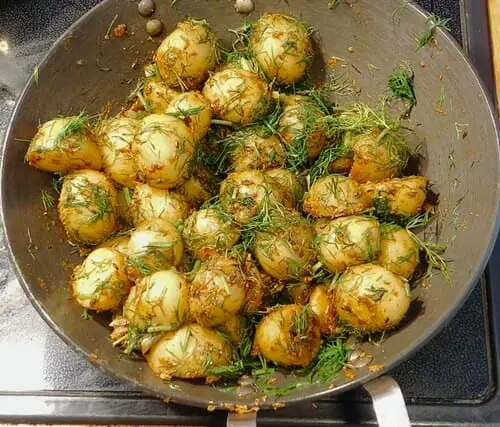 New potatoes and dill in a pan 