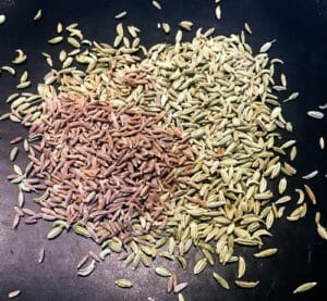 Dry roasting Whole spices on a pan 