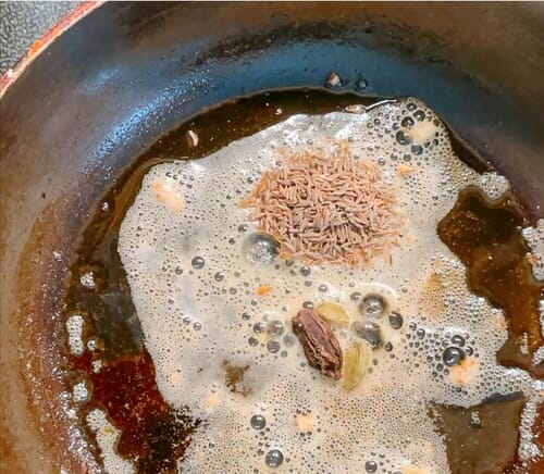 Fry whole spices in oil 