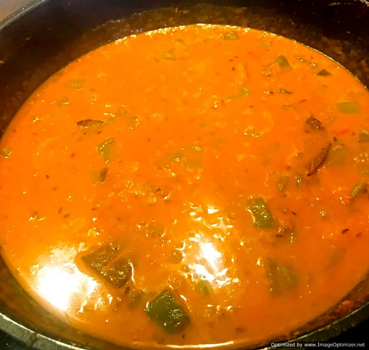 Add water to the pumpkin curry to make the sauce