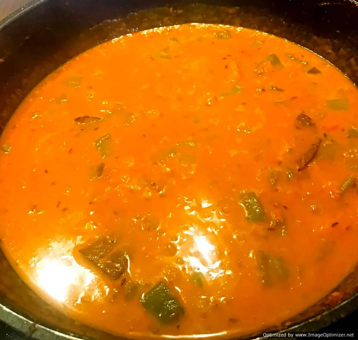 Add water to the pumpkin curry to make the sauce