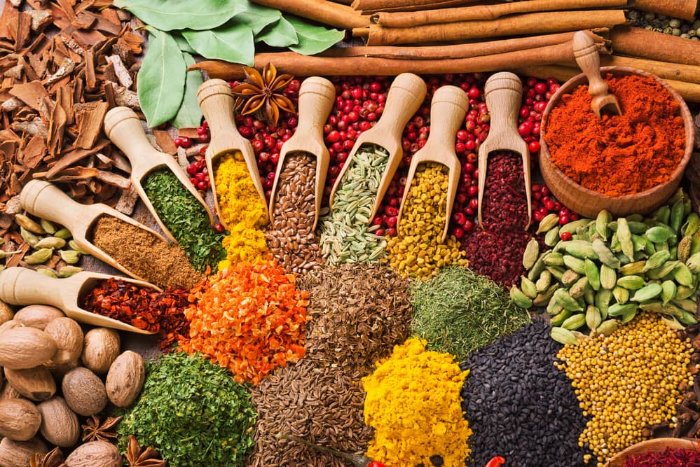 Different types of spices on a mat 
